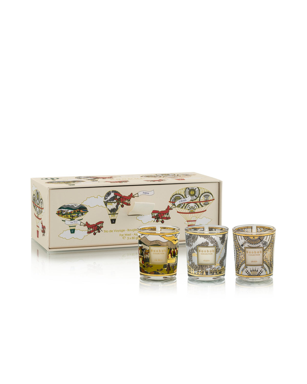 Coffret Baobab Trio Travel Aspen, Likááh, Far West : trois bougies Mini et leur boîte illustrée de montgolfières et d'avions